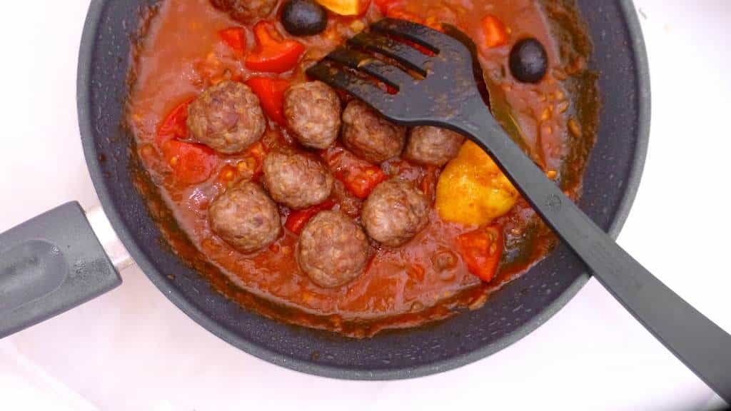 My spiced garam masala meatballs in a tangy tomato and lemon sauce drizzled with yogurt, the perfect lamb meatball curry...