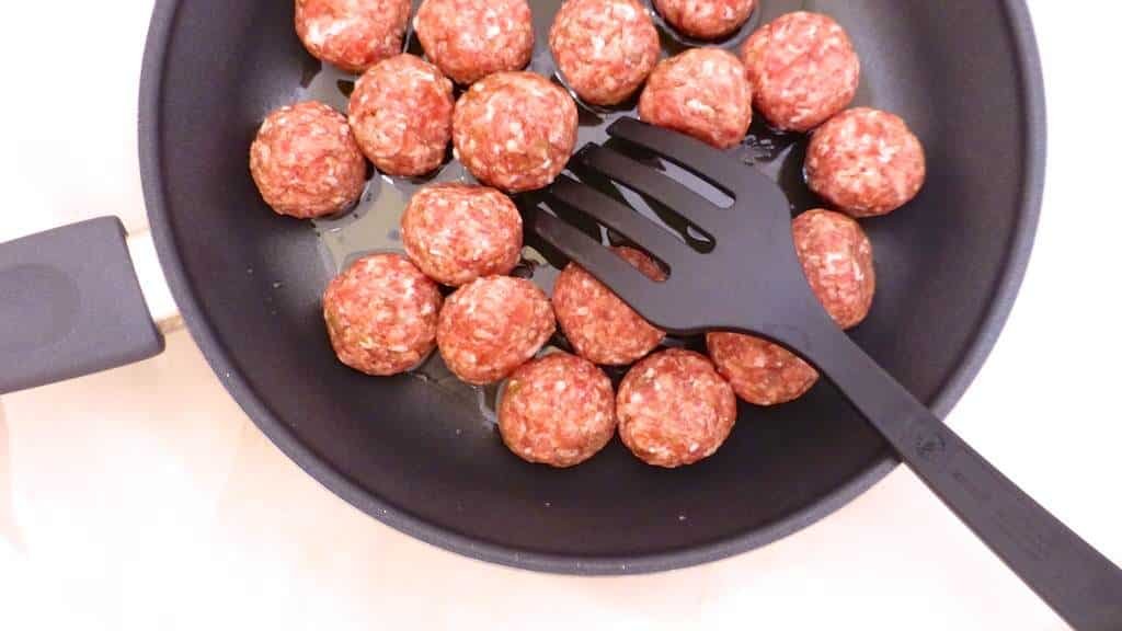 My spiced garam masala meatballs in a tangy tomato and lemon sauce drizzled with yogurt, the perfect lamb meatball curry...