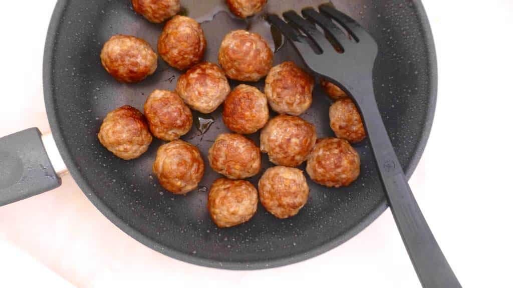 My spiced garam masala meatballs in a tangy tomato and lemon sauce drizzled with yogurt, the perfect lamb meatball curry...