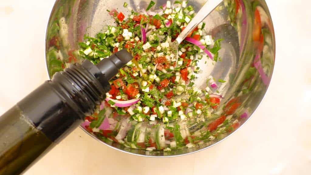 Salpicon de pulpo, a fresh Spanish salad with octopus, vegetables and red wine vinegar! Serve it as lunch, appetizer or a seafood salad!