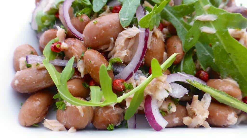 Easy Avocado Dressing for Bean Salads A bunch of beans and vegetables topped with a layer of this gorgeous creamy avocado dressing... What a great lunch idea!!