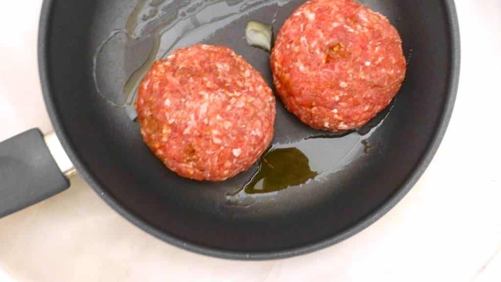 Look at that creamy cilantro lime butter melting on top of a homemade chili hamburger steak! This cilantro butter is so easy to make at home!