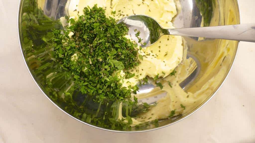 Rain, sun or snow: corn on the cob with cilantro butter always tastes great! This is an amazingly flavorful side dish recipe!