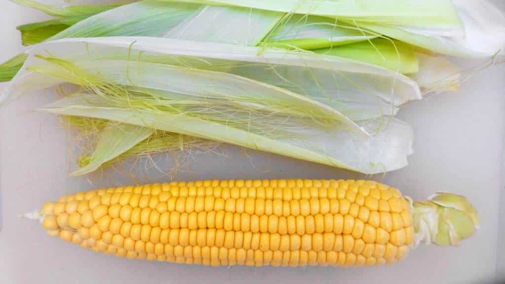 Rain, sun or snow: corn on the cob with cilantro butter always tastes great! This is an amazingly flavorful side dish recipe!