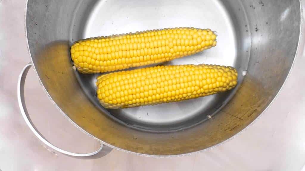 Rain, sun or snow: corn on the cob with cilantro butter always tastes great! This is an amazingly flavorful side dish recipe!