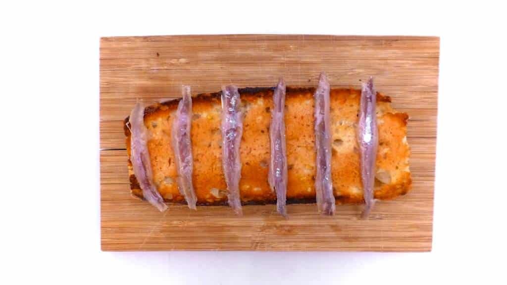 Crunchy Spanish tosta matrimonio or pickled anchovies and salted anchovies on a slice of pan con tomate, the perfect wedding!