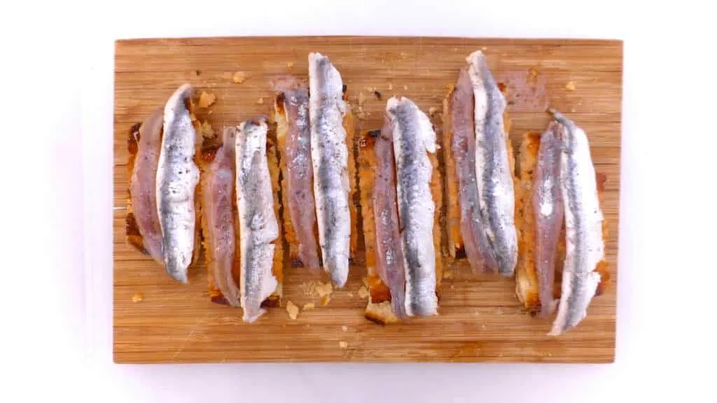 Best Tosta Matrimonio (Anchovy Toast) Crunchy Spanish tosta matrimonio or pickled anchovies and salted anchovies on a slice of pan con tomate, the perfect wedding!