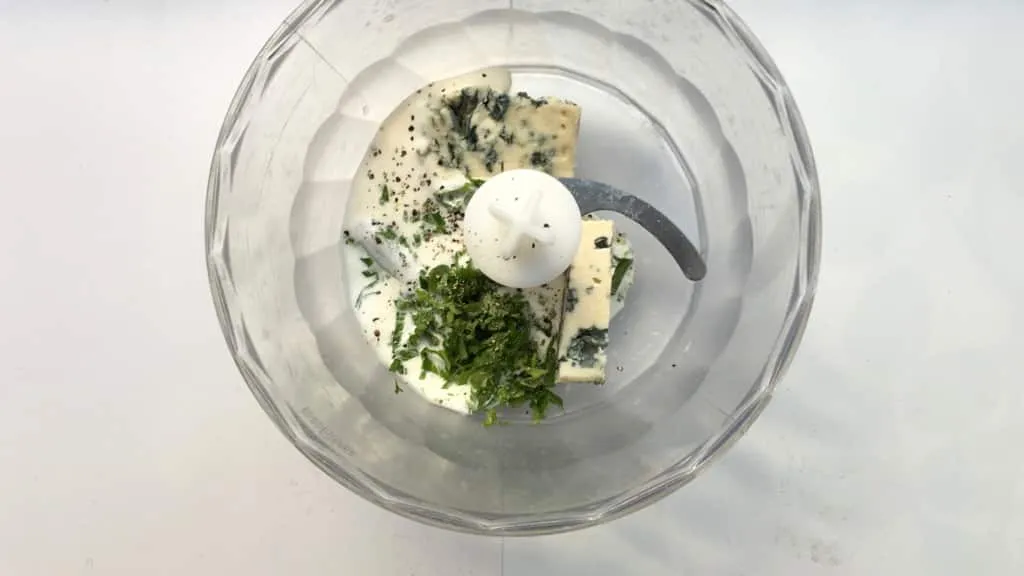 Easy Fresh Apple Celery Salad Recipe What a fancy looking apple and celery salad this is! Look at that delicious homemade creamy blue cheese dressing drizzled on top, epic!