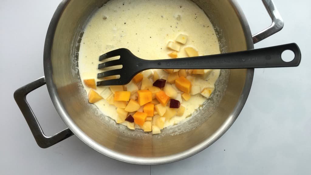 Steamed cod in a creamy winter vegetable navarin “de la mer”, a lighter fish version of the classic French lamb navarin stew!