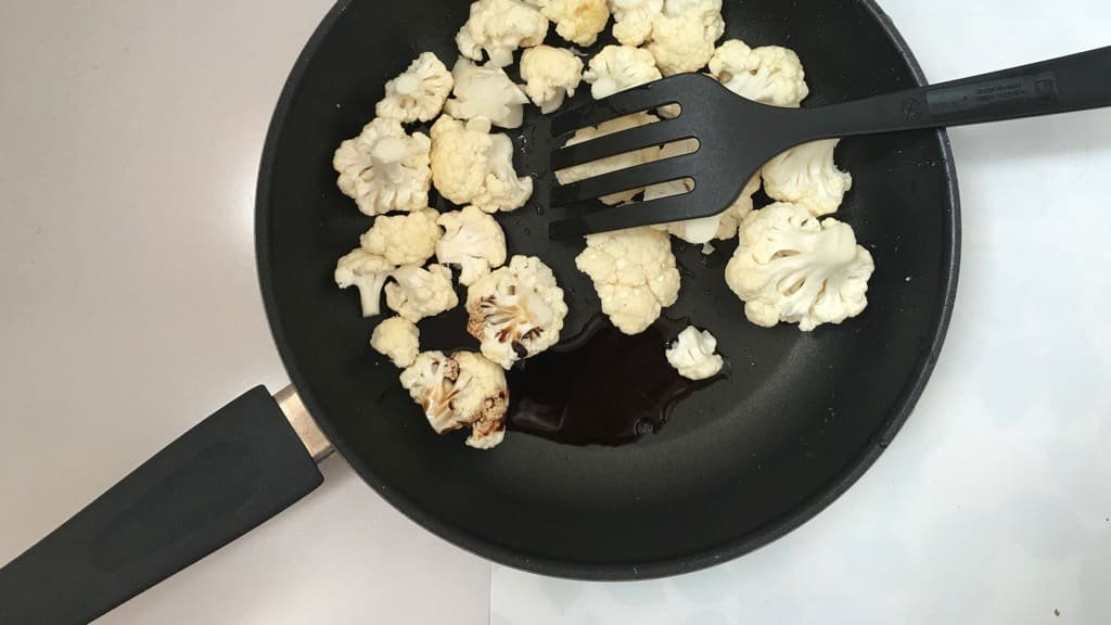 Crunchy vegetables in a simple oyster and fish sauce marinade... this Thai cauliflower stir fry is a quick and healthy side dish!