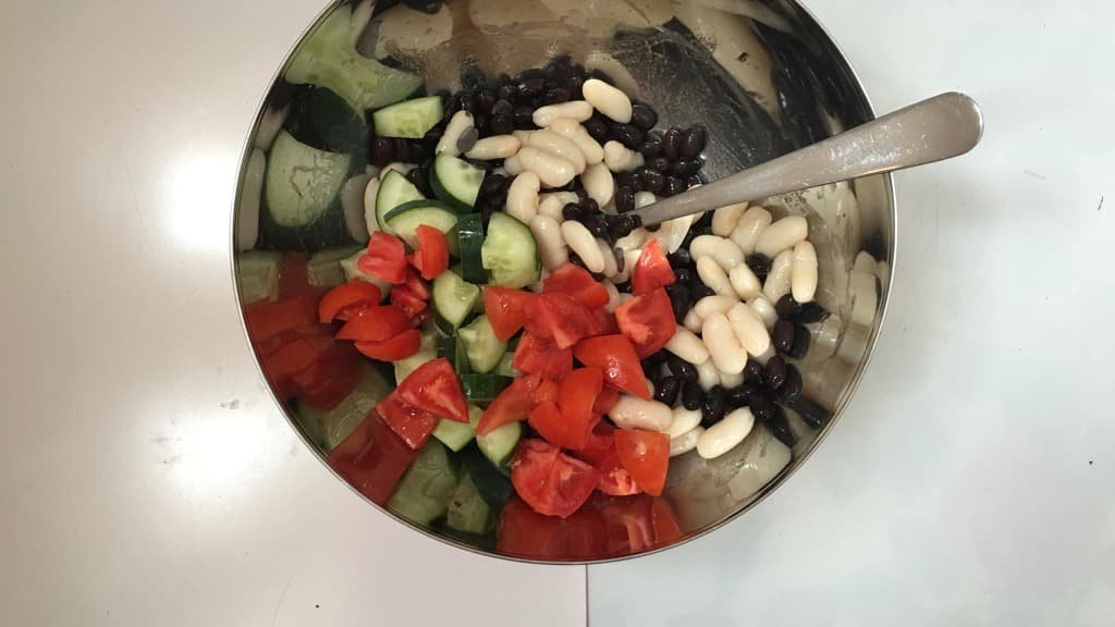A bunch of beans and vegetables topped with a layer of this gorgeous creamy avocado dressing... What a great lunch idea!!