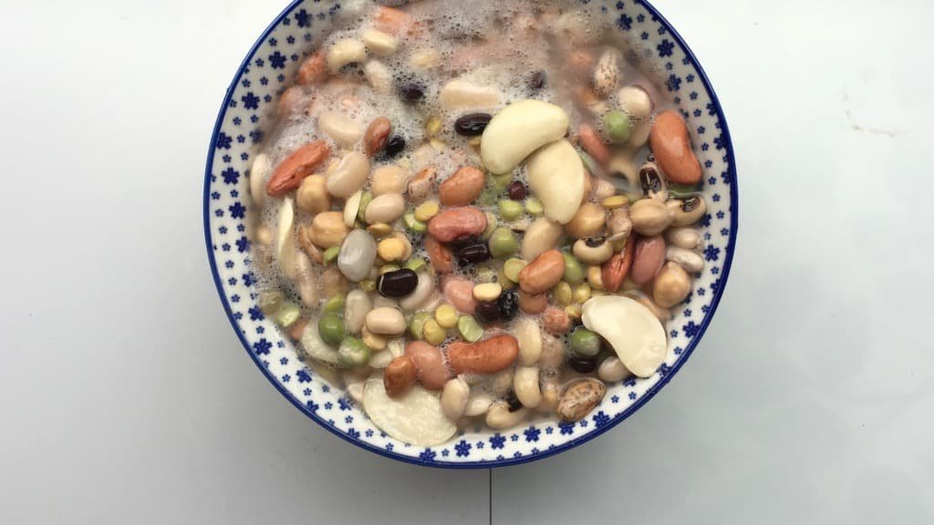 I used a bunch of Indian spices here in combination with dried beans, tomatoes and yogurt... this mixed bean stew is deliciously spicy and creamy!