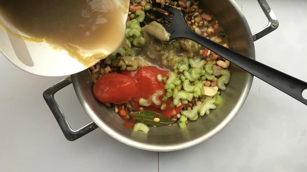 I used a bunch of Indian spices here in combination with dried beans, tomatoes and yogurt... this mixed bean stew is deliciously spicy and creamy!