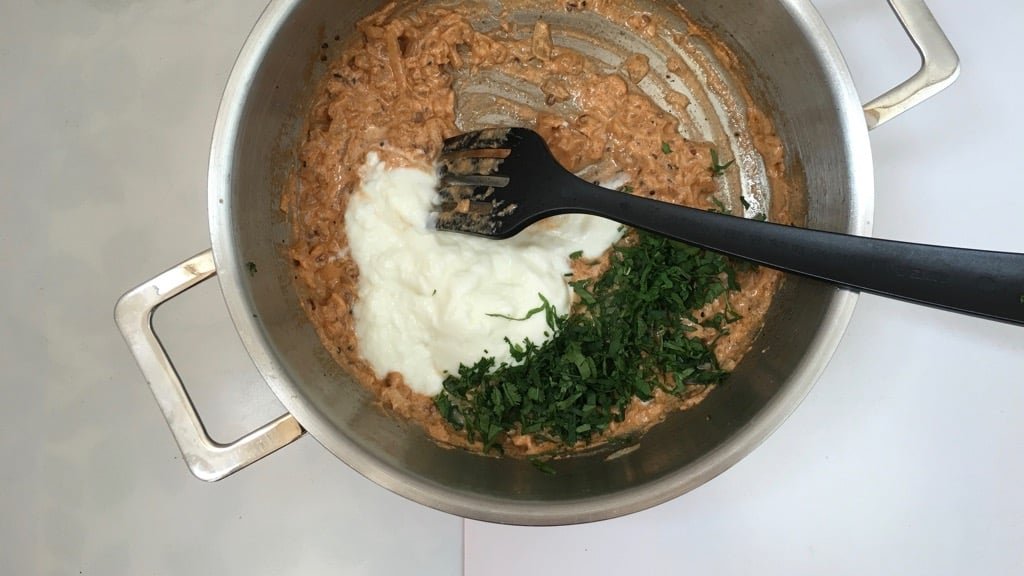This refreshing and soothing eggplant in yogurt sauce is a great side dish to serve with your next spicy Indian curry dinner!