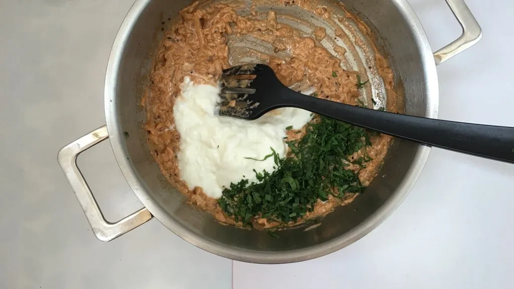 This refreshing and soothing eggplant in yogurt sauce is a great side dish to serve with your next spicy Indian curry dinner!
