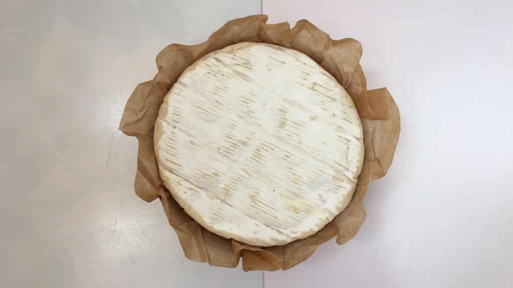 This baked camembert is a classic appetizer, or serve it for lunch with some freshly grilled French bread! I can't get enough of this gooey stuff...