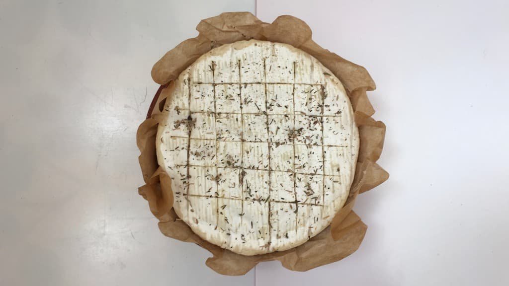 This baked camembert is a classic appetizer, or serve it for lunch with some freshly grilled French bread! I can't get enough of this gooey stuff...