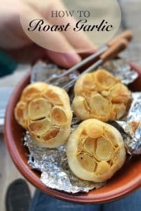 How to roast garlic: caramelized oven roasted garlic bulbs in tinfoil and olive oil, a very easy method to roast fresh garlic!