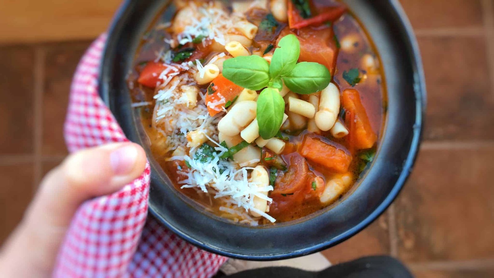 A classic Italian pasta and bean soup with fresh tomatoes and basil: here is my homemade pasta fazool soup with pasta and beans!