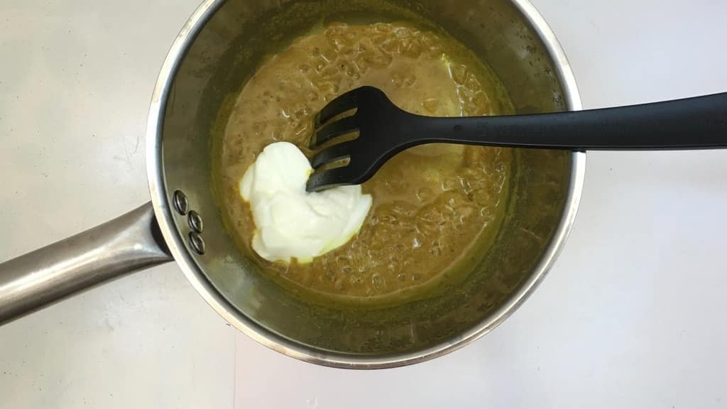 Vegetarian stuffed cabbage rolls with leftover hard-boiled eggs and a quick curry cream sauce... simple but perfect comfort food!