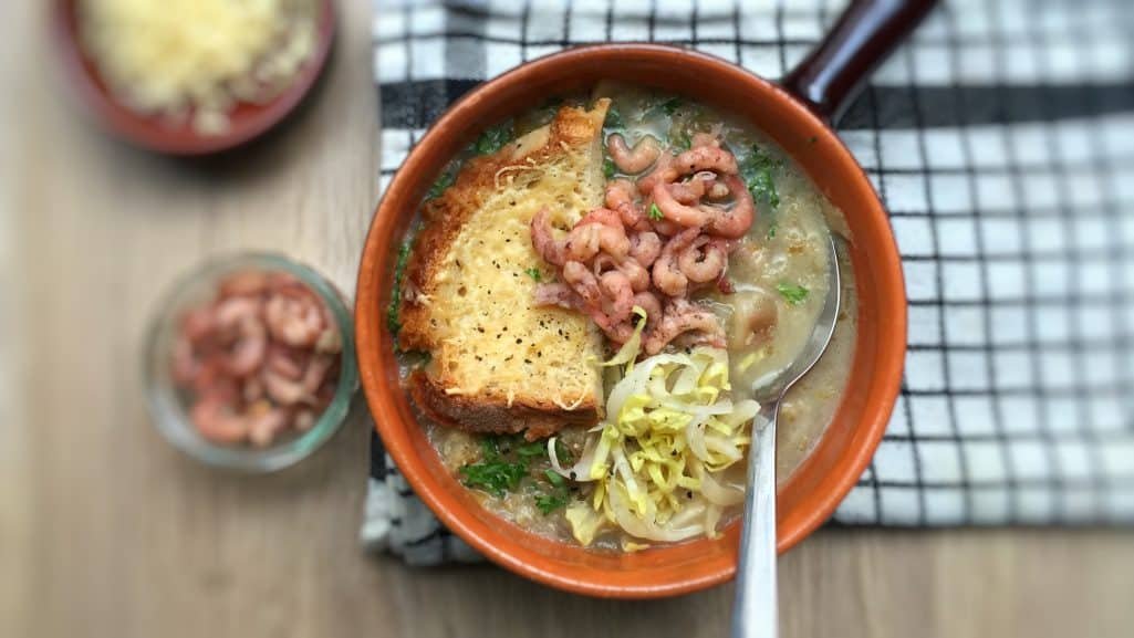 Top notch Belgian products in this beer and endive soup! Fresh endives, grey North Sea shrimp, a local strong ale and grated Belgian trappist cheese!