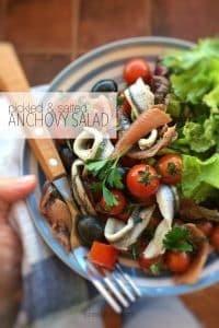 Easy Tomato Anchovy Salad with Olives This anchovy salad with tomatoes and black olives is a great lunch treat for a hot summer day! You should try this combo, it’s a fantastic flavor explosion!