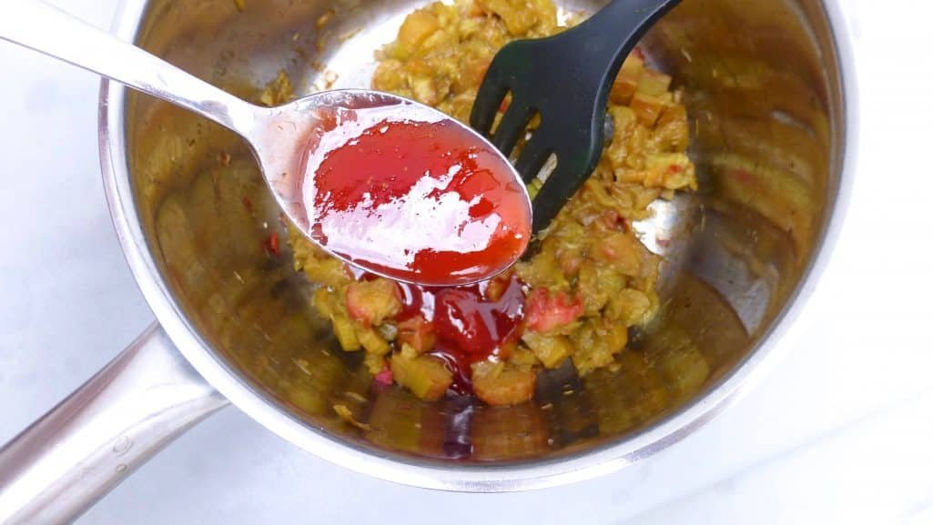 Rhubarb crumble recipe: sugary smooth rhubarb and strawberry tomato jam topped with a crunchy salted pistachio crumble!