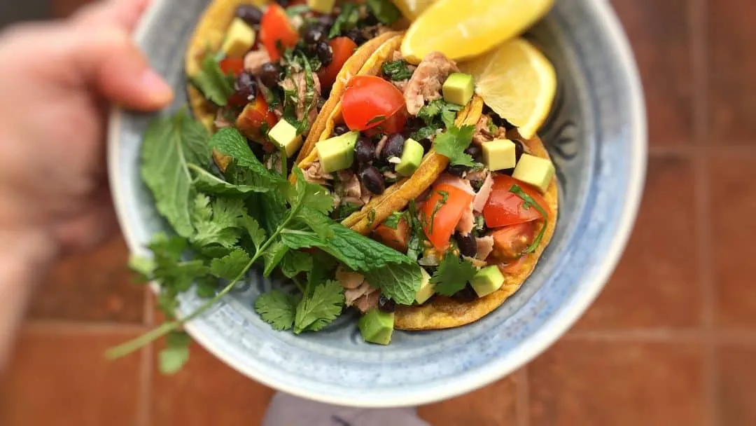 One hour is all it takes to bake and stuff these homemade soft tacos! Fill them up with tuna, avocado and pico de gallo... Yum!