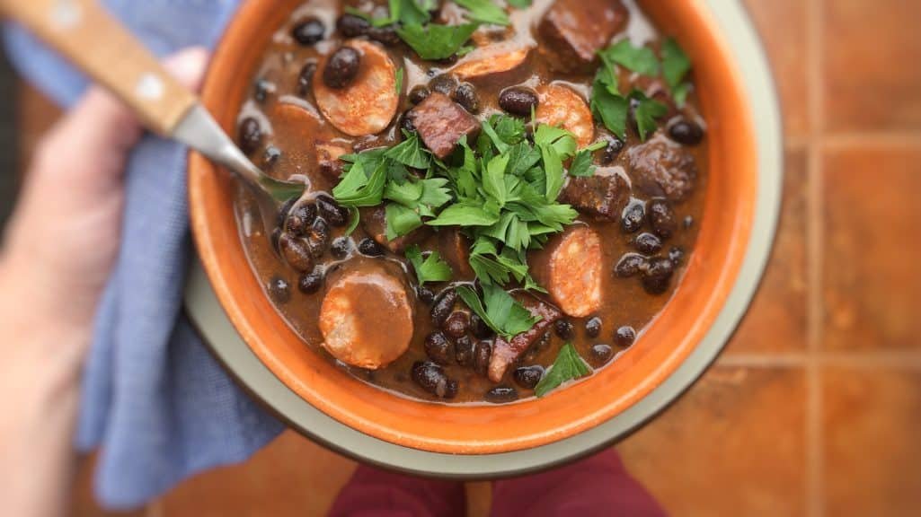 Here's my version of the popular Brazilian feijoada bean stew! Smooth black beans, pork sausage and minced meat... What a treat!