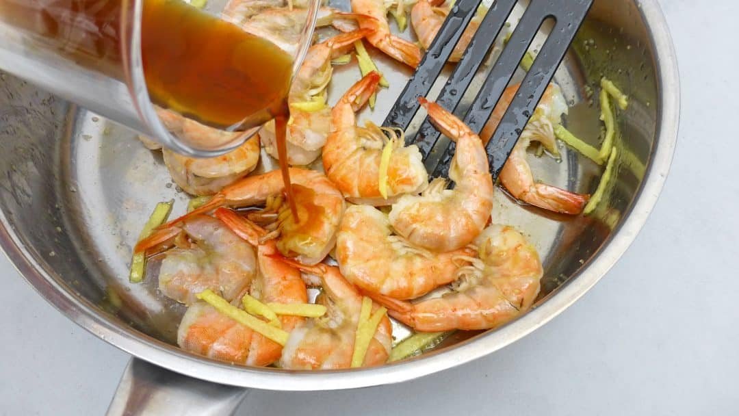 Sauteed shrimp, a simple seafood stir fry with fresh ginger and a flavorful soy sauce marinade... you will love this one!