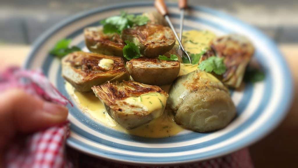 Looking for a yummy appetizer bite or a super savory side dish? You will just adore these fried artichokes in homemade cilantro mayo!