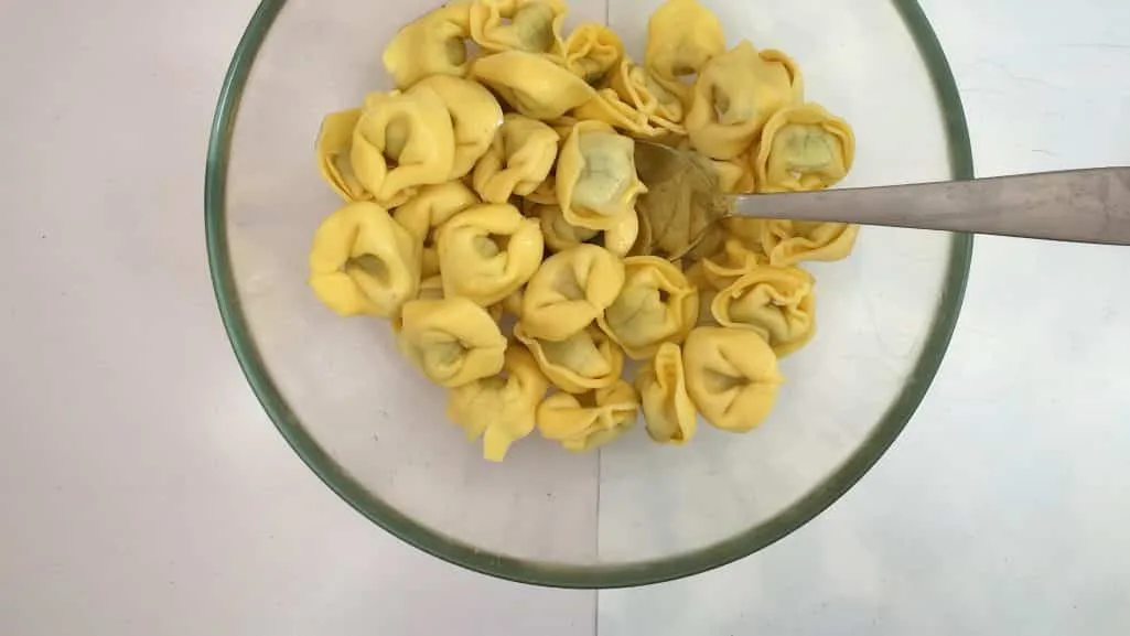 Best Basil Pesto Tortellini Pasta Salad Serve this fresh basil pesto tortellini pasta salad warm or cold: as a hot pasta dinner… or tasty cold lunchbox salad to take with you!