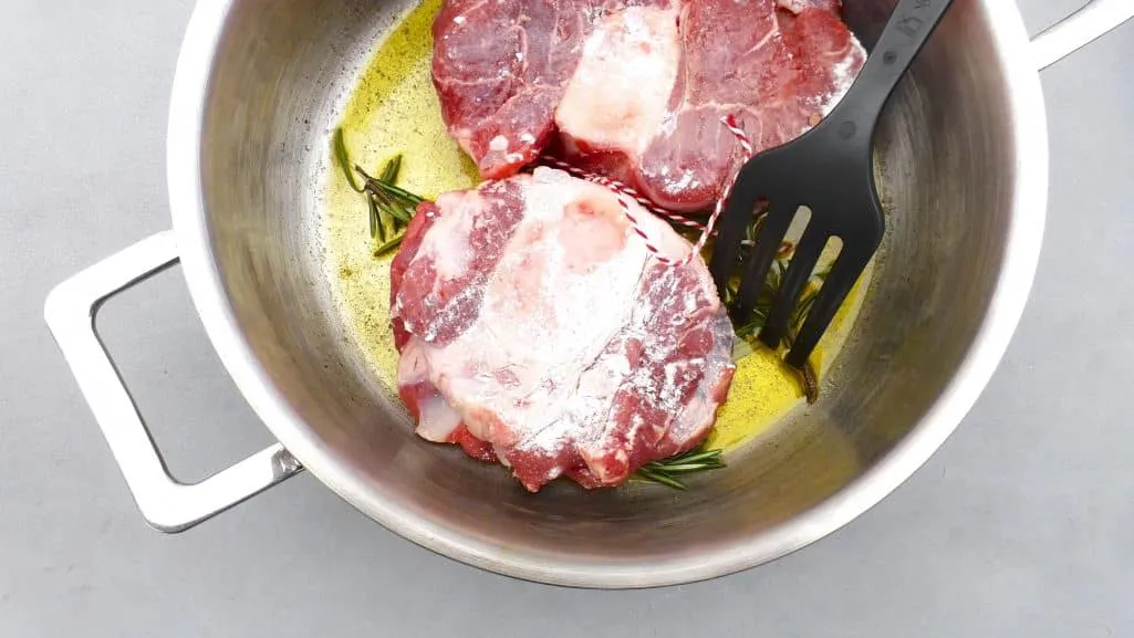 Traditional ossobuco alla Milanese! Or classic braised veal shanks in a flavorful tomato wine sauce with zesty gremolata...