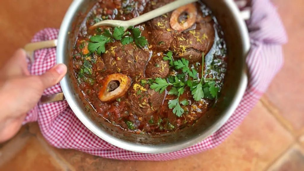 Traditional ossobuco alla Milanese! Or classic braised veal shanks in a flavorful tomato wine sauce with zesty gremolata...