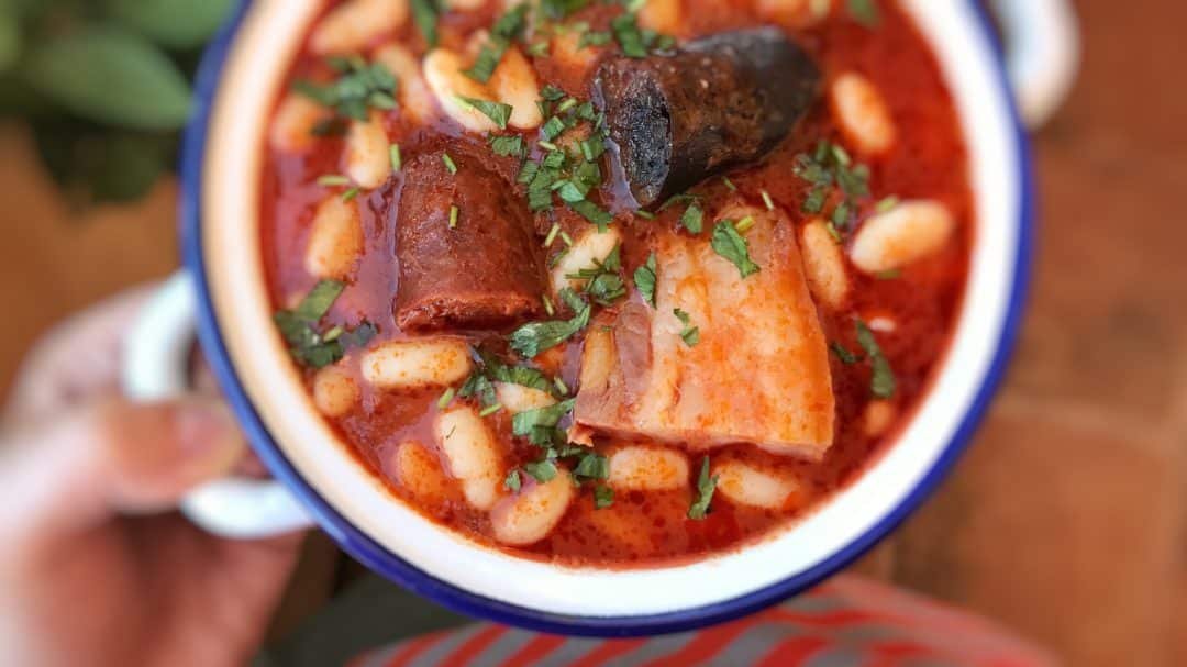 Spanish fabada asturiana, a great bean stew with smoked chorizo sausage, a thick slab of panceta and one blood sausage...