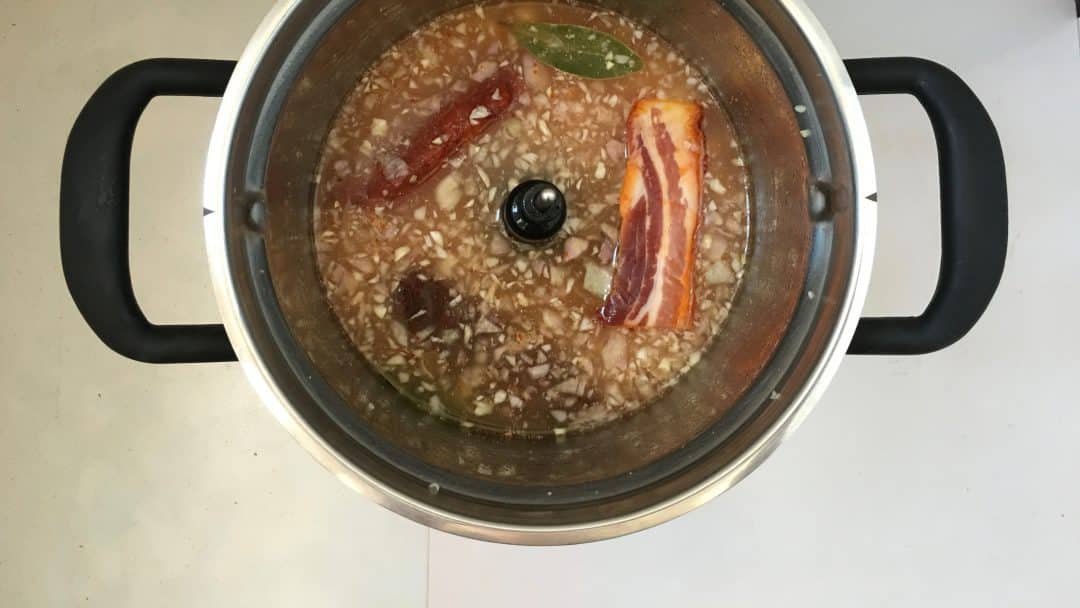 Spanish fabada asturiana, a great bean stew with smoked chorizo sausage, a thick slab of panceta and one blood sausage...