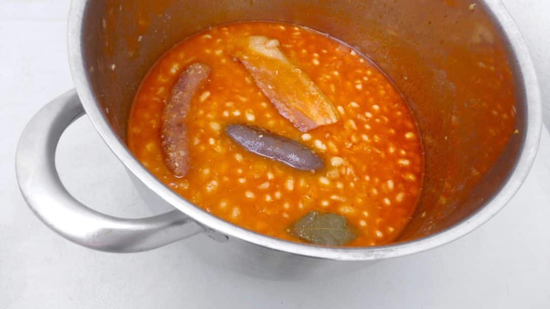 Spanish fabada asturiana, a great bean stew with smoked chorizo sausage, a thick slab of panceta and one blood sausage...