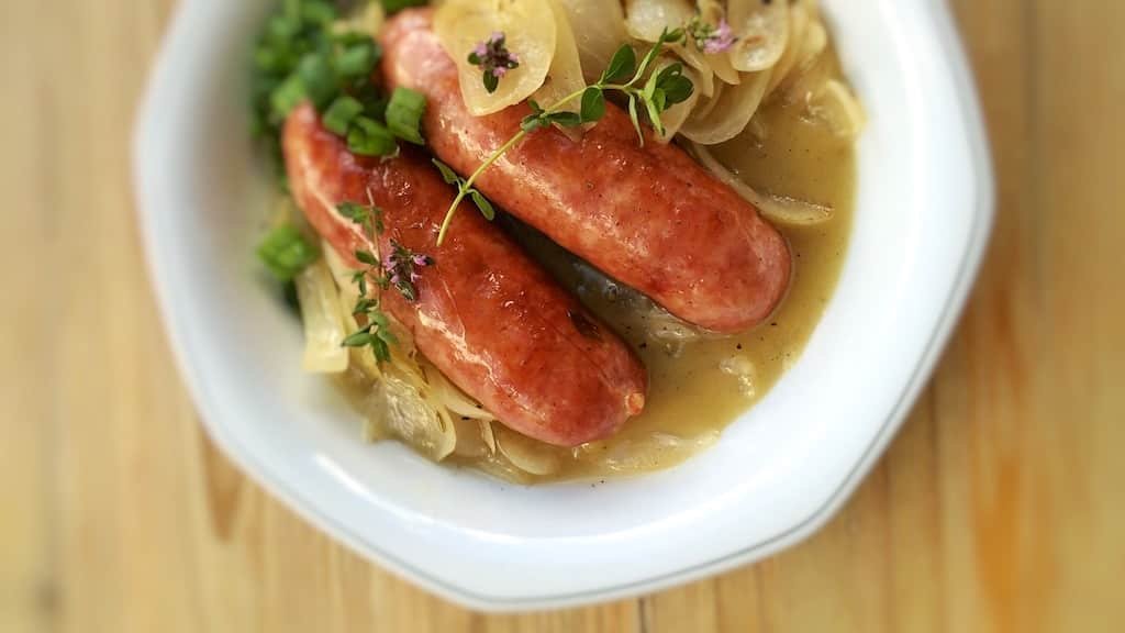 Classic Savoie diots nutmeg sausages in onion sauce! And more about reblochon cheese... I love French Alps food and mountain dishes...