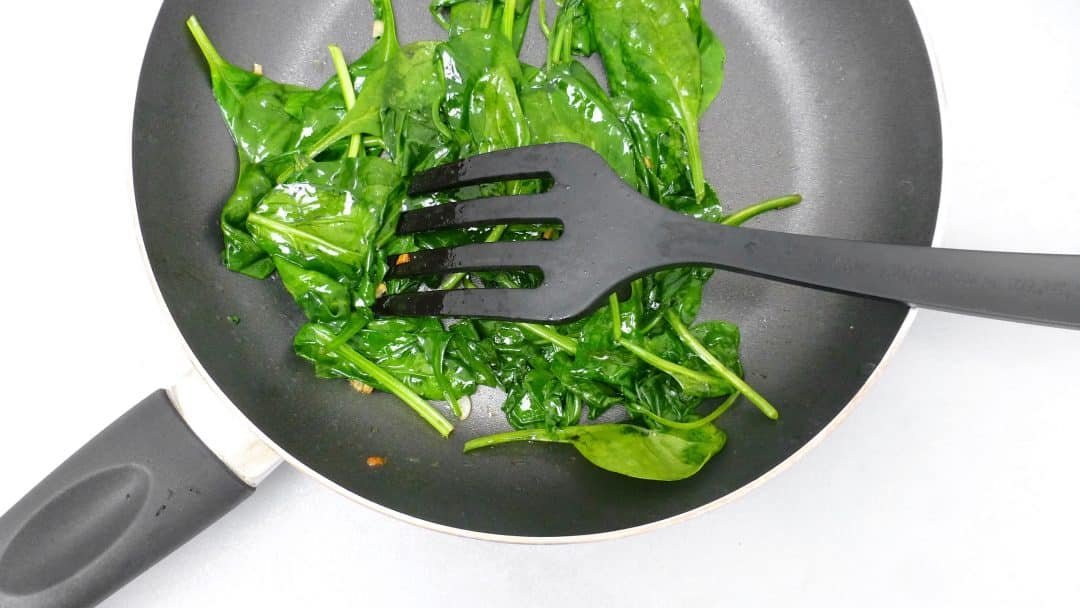 Here's a quick and easy spinach omelette with gooey stilton blue cheese and garlicky spinach... What a great breakfast or brunch recipe idea!
