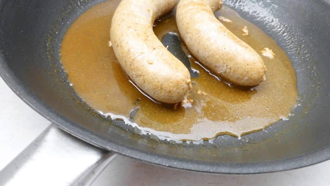 This is hands down my husband's favorite comfort food: fried bangers and creamy potato mash topped with a strong onion guinness gravy!