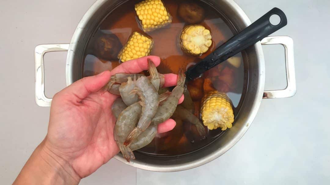 Finger lickin' good... classic shrimp boil with corn, potatoes, sausage and Old Bay seasoning of course!! Delicious summer fest...