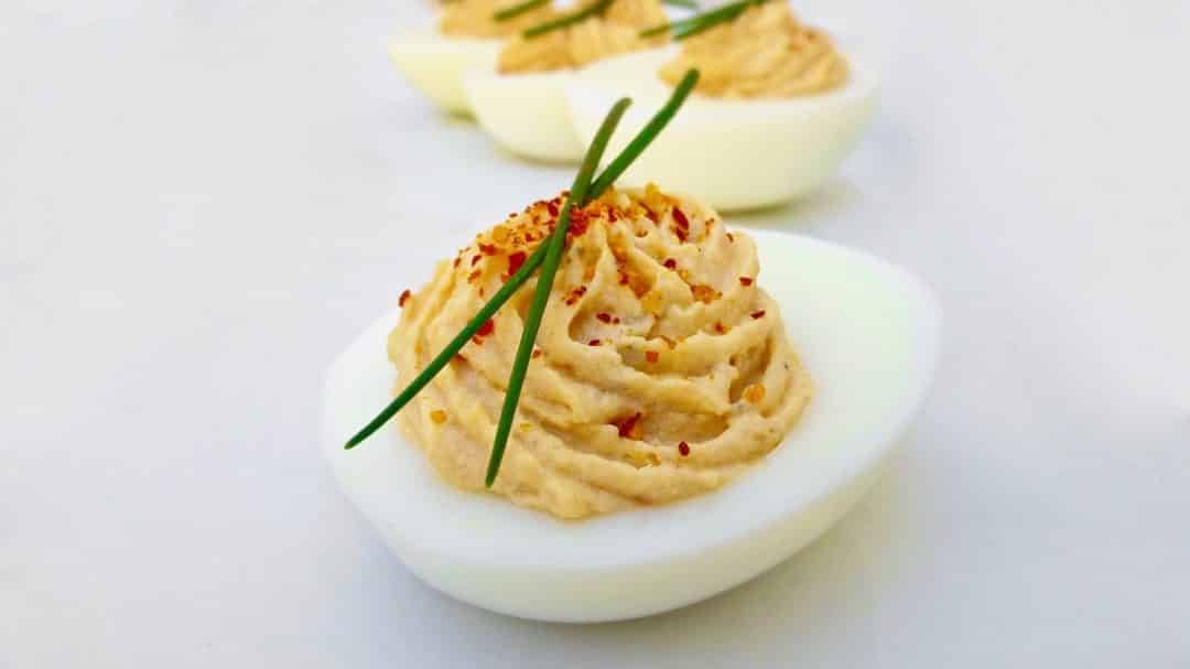 Easy Deviled Eggs with Ham Appetizers Here's a cute little appetizer bite for you to try out: my super simple deviled eggs stuffed with a creamy ham filling...
