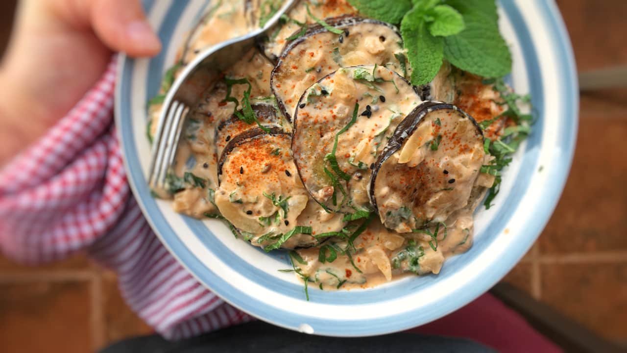 This refreshing and soothing eggplant with yogurt sauce is a great side dish to serve with your next spicy Indian curry dinner!