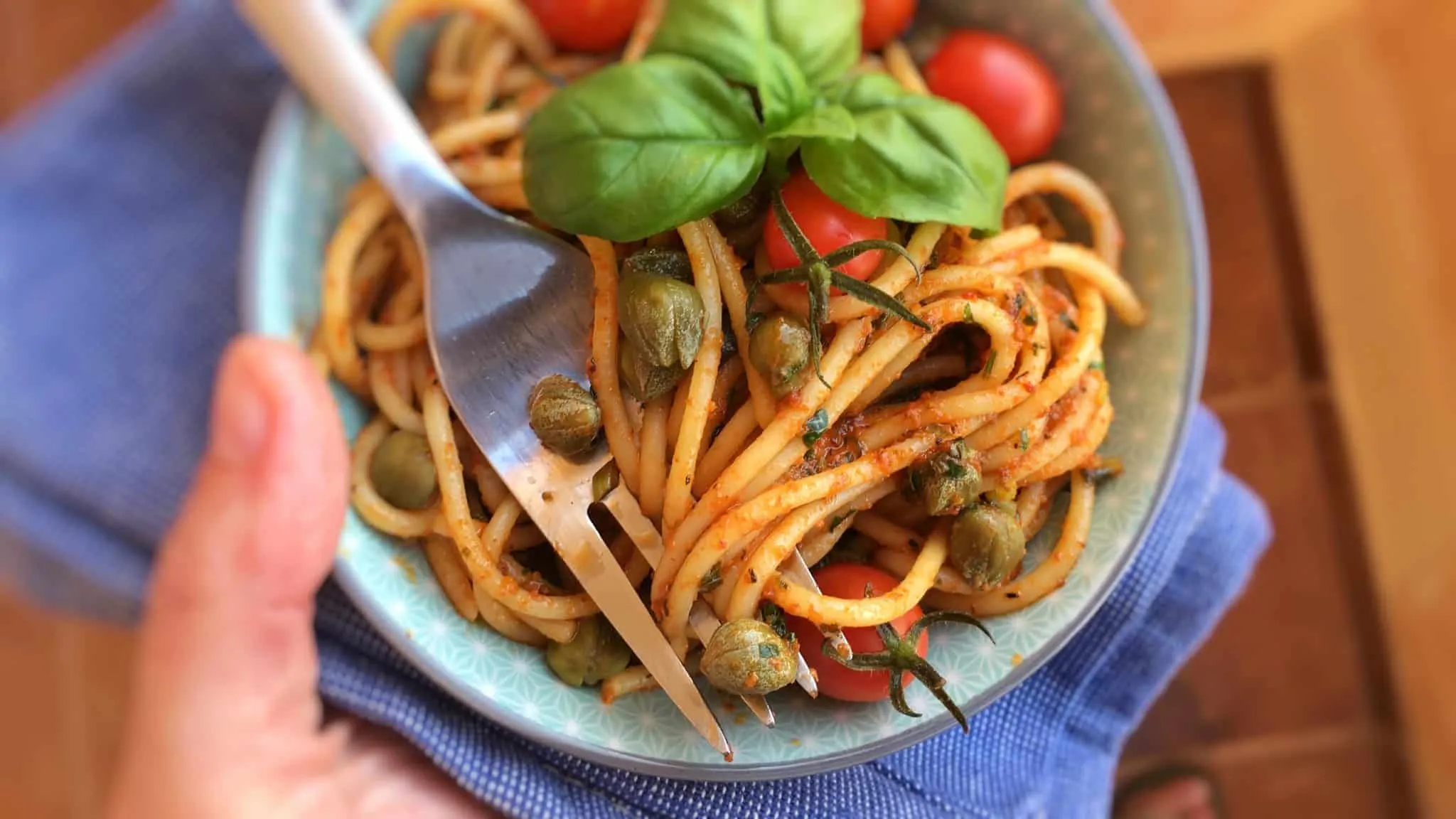 Easy Spicy Pasta with Harissa Paste Red alert because this hot and spicy pasta bowl is so addictive! It contains al dente spaghetti, capers in brine, olive oil and highly delicious harissa paste.