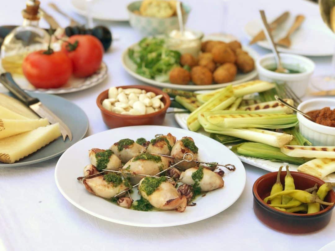 Easy Stuffed Squid with Mojo Verde Ready for a summer party and a table covered with a bunch of Spanish treats? Then try my homemade stuffed squid with mojo verde!
