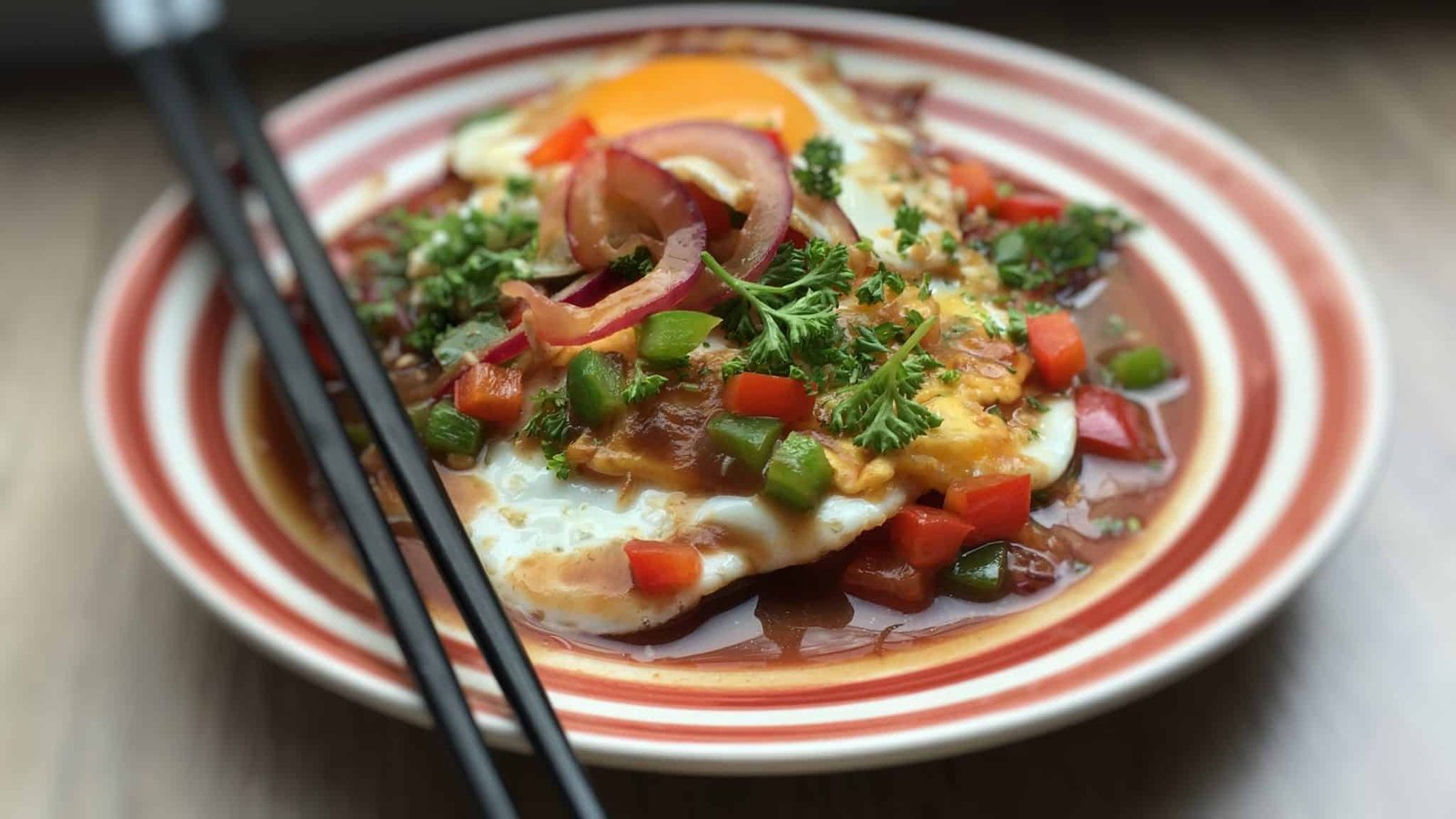 Eggcelent Nyonya eggs belanda or... delicious fried eggs in a sweet and sour tamarind gravy! This is a great food memory from the island of Penang, Malaysia.