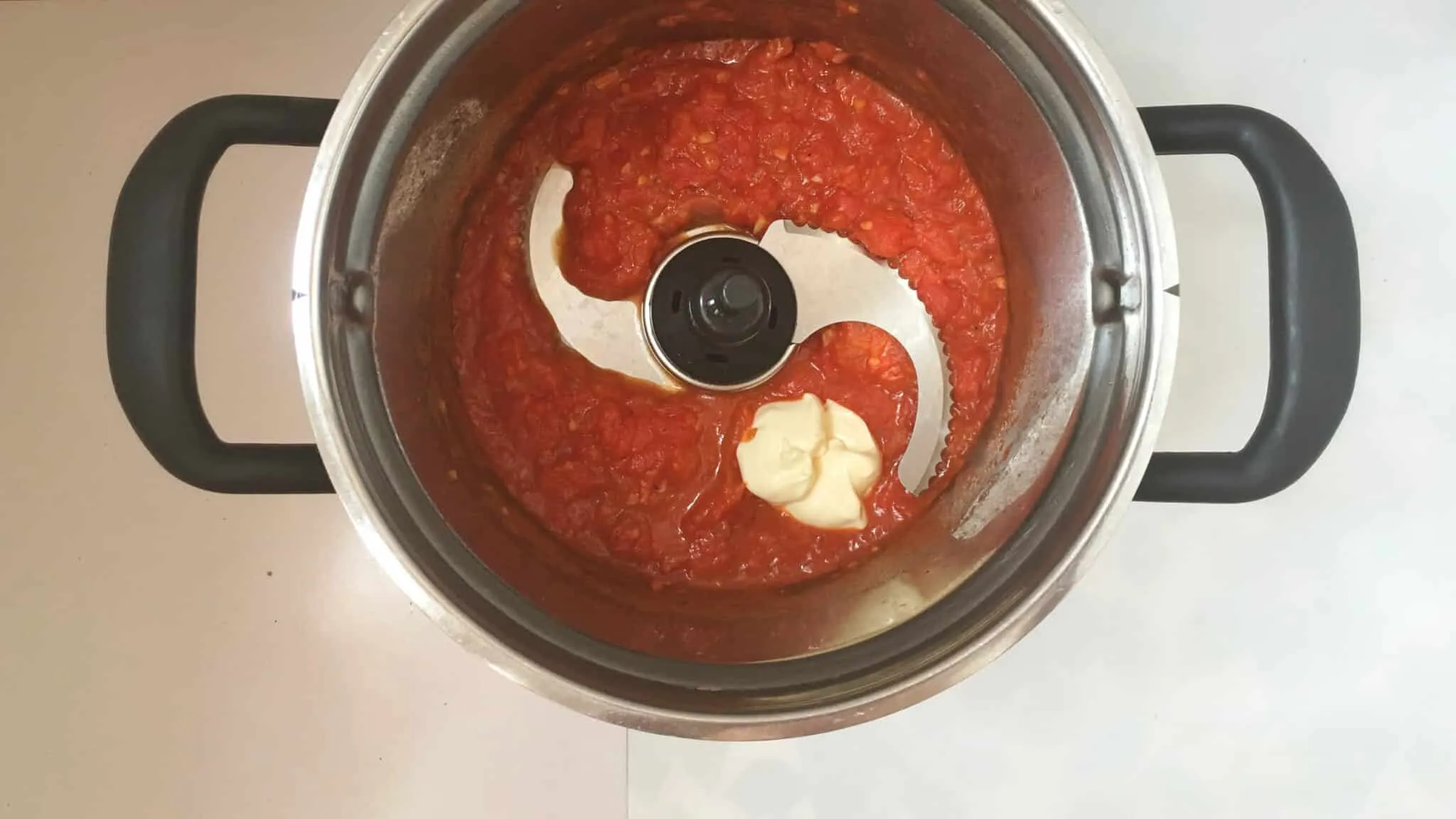 Here's the creamiest brava sauce recipe you will ever taste: the best Spanish brava sauce to dip your homemade patatas bravas in! It's tapas time.