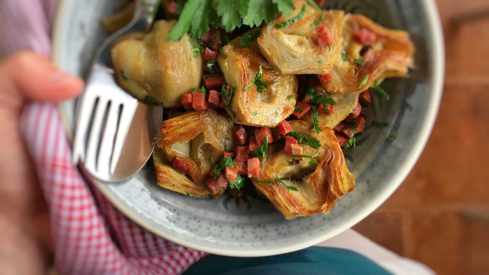 Pan fried artichokes in white wine sauce with dried chorizo sausage and fresh parsley! This winner is a great vegetable side dish for grilled steaks or fish!