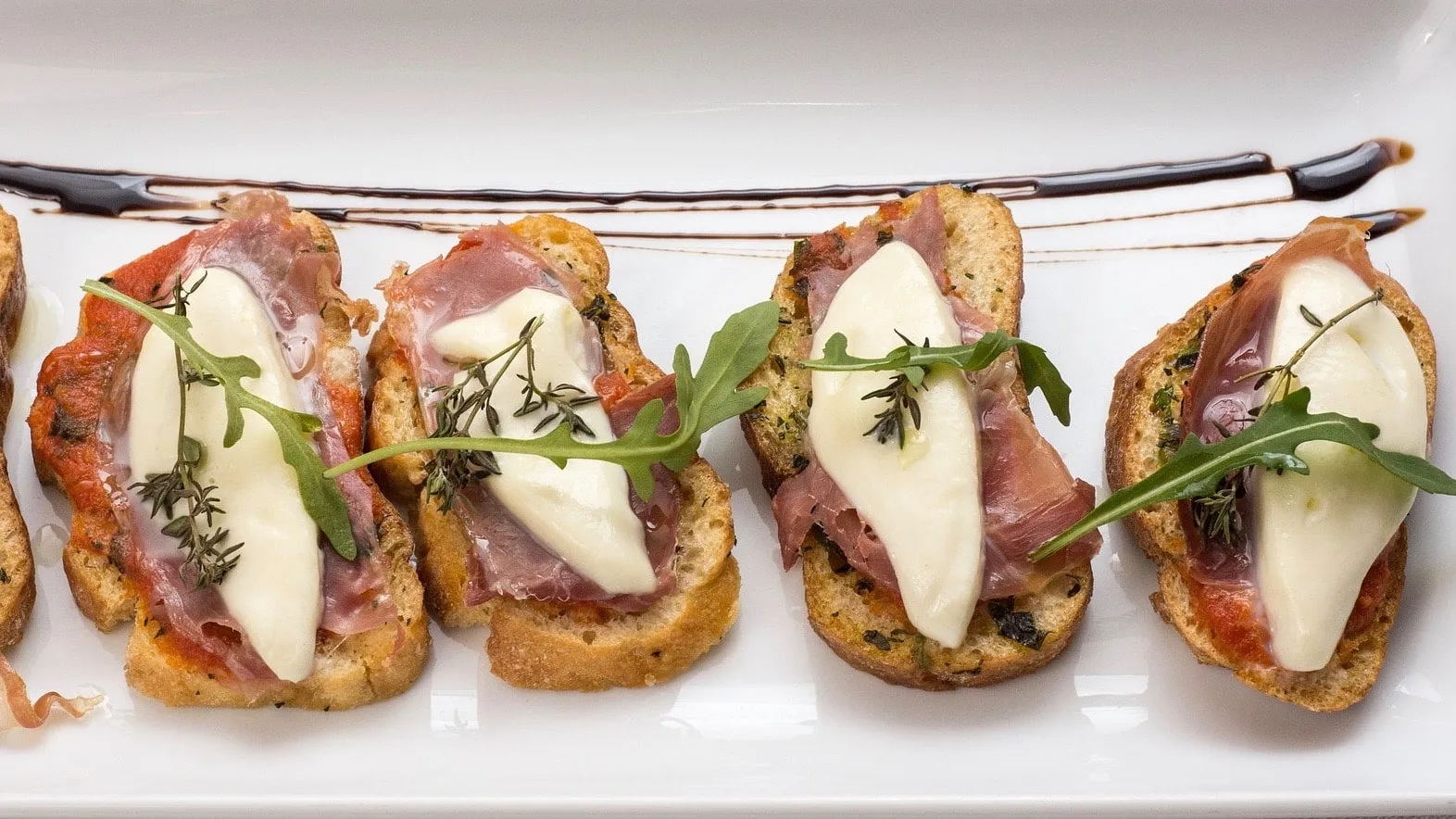 Easy Italian Bruschetta Recipe Here's a classic summer appetizer: my Italian bruschetta recipe. Plain and simple diced tomatoes with fresh basil on grilled bread crostini. Light and healthy!