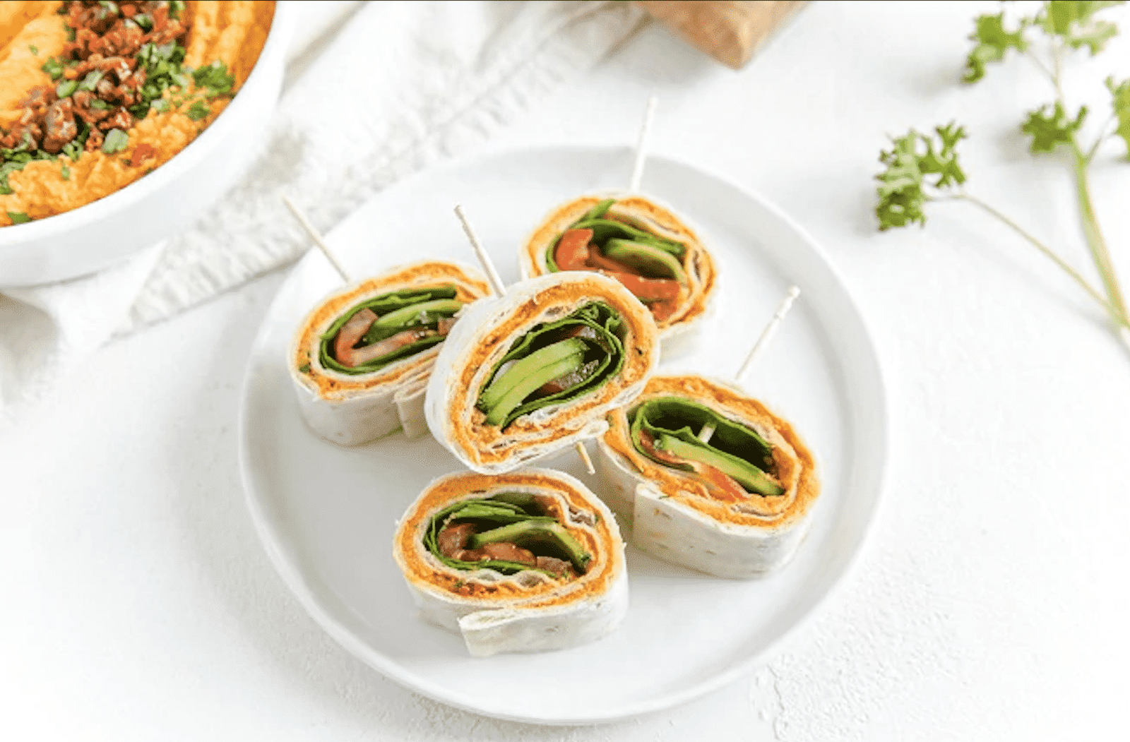 Are you looking for creative roll ups for a lunchbox, potluck party or as an appetizer? Check out these 20 pinwheel recipes from fellow food bloggers!